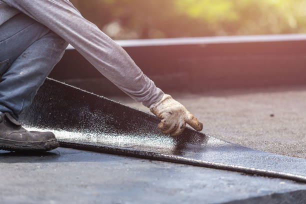 Professional Basement Waterproofing technician working in Paris, KY